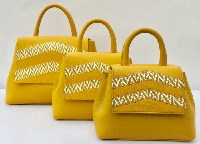 three yellow bags in a row